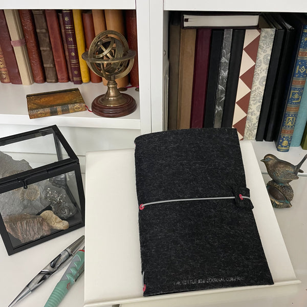 Gift box containing a refillable A5 journal notebook and a matching tear off desk notepad