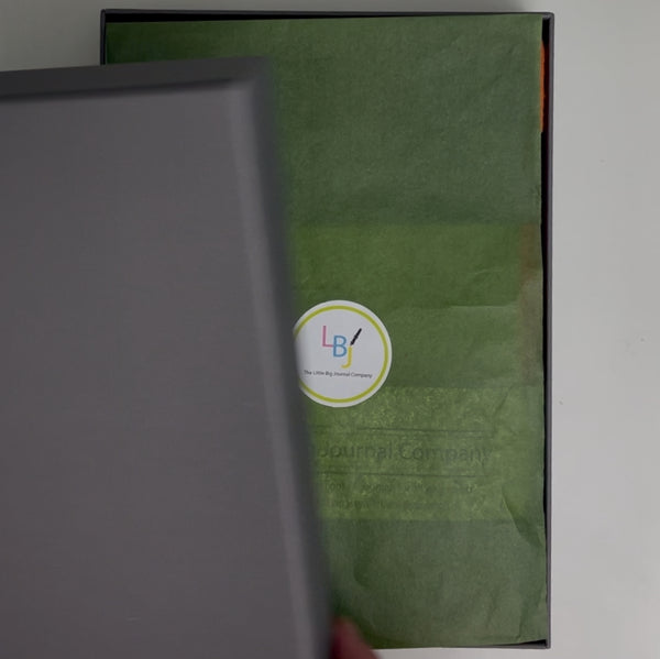 Gift box containing a refillable A5 journal notebook and a matching tear off desk notepad