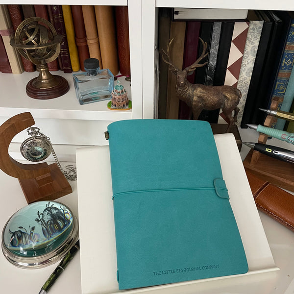 Gift box containing a refillable A5 journal notebook and a matching tear off desk notepad