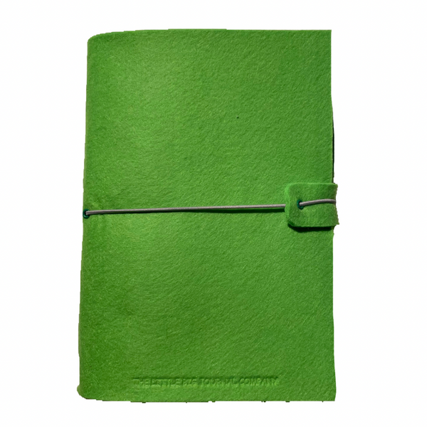 Bright green A5 felt journal wrap on blank background