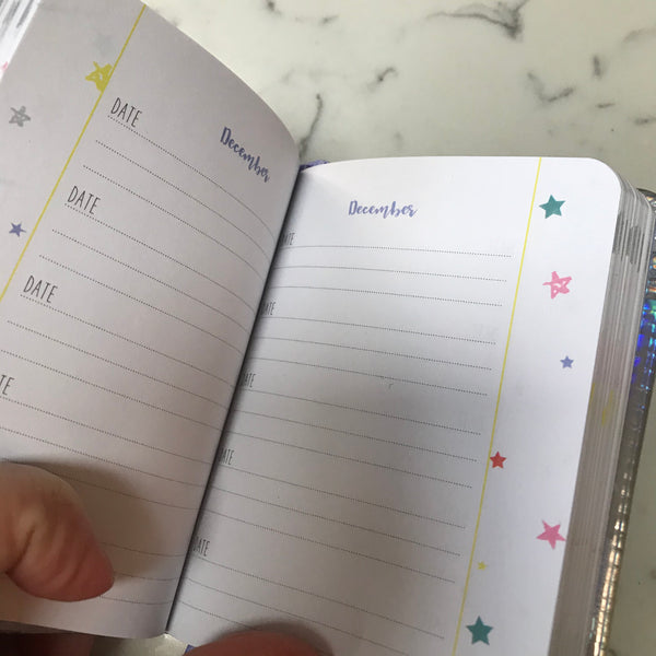 One thought a day mini journal with printed months and space for date