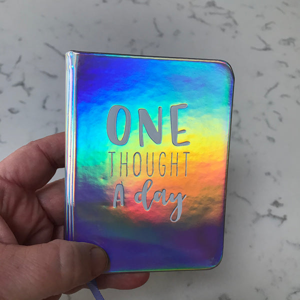 One thought a day mini journal with printed months and space for date