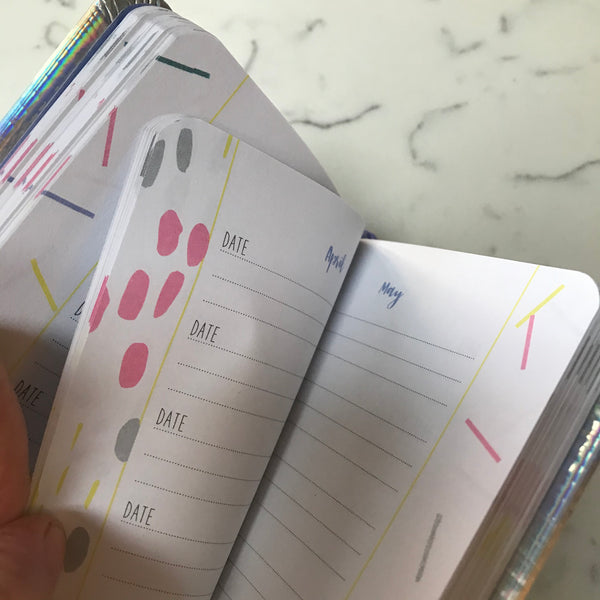 One thought a day mini journal with printed months and space for date