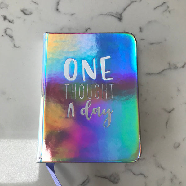 One thought a day mini journal with printed months and space for date
